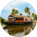 Traditional Kerala houseboat cruising peacefully through the backwaters surrounded by coconut palms.